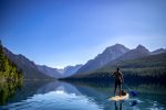 Paddle board in a postcard on Bowman Lake in Glacier National Park.